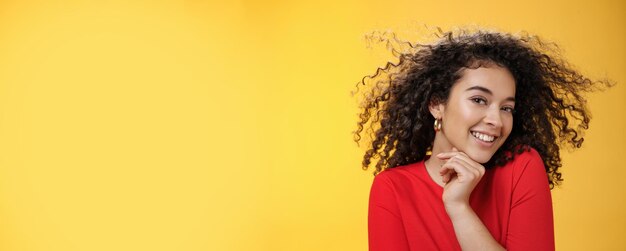 Romance women and beauty concept portrait of tender and gentle pretty woman with curly hair flying i