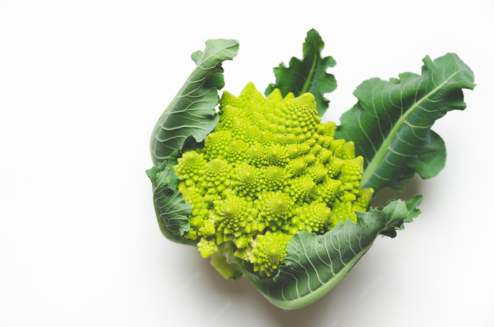 Premium Photo Romanesco broccoli with leaves on white background with