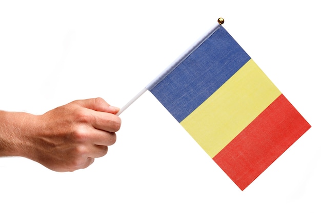 Romania flag small in hand isolate.