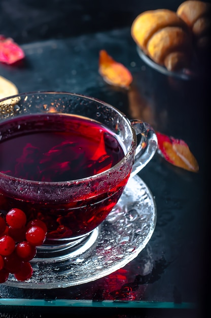 Romantic autumn cup of tea with  leaves  