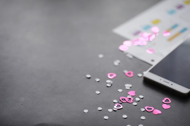 Romantic background. The concept of love and relationships. Heart shaped figures on a dark background. Card for Valentine's Day.