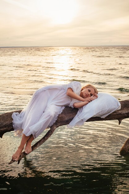 Romantic blonde woman sleeping on the fresh air