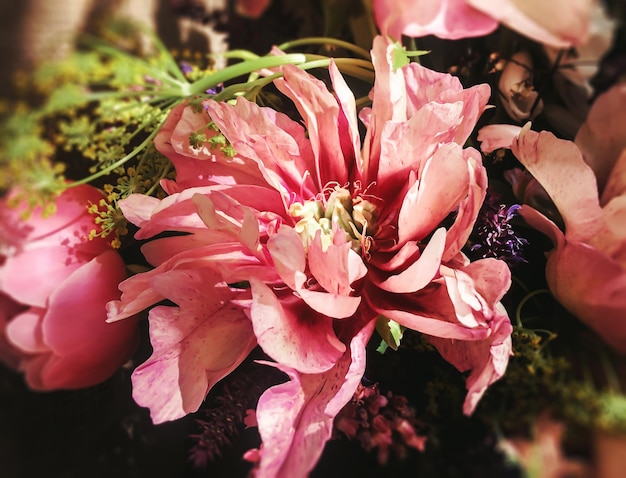 Romantic bouquets of spring flowers with peonies sage foxglove geyhera