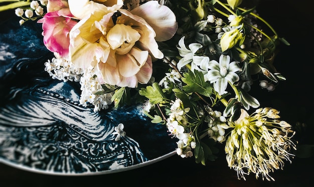 Romantic bouquets of spring flowers with tulip allium tarantula