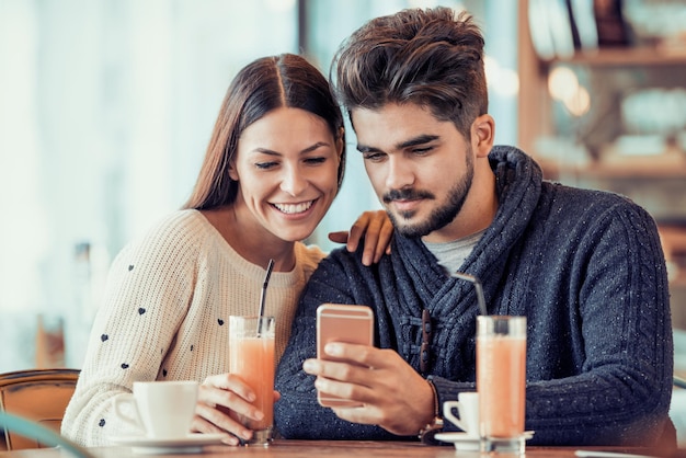 Romantic couple having rest in cafe