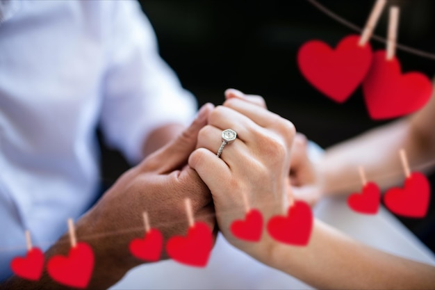 Romantic couple holding hands