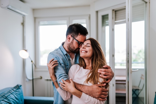 Romantic couple at home.