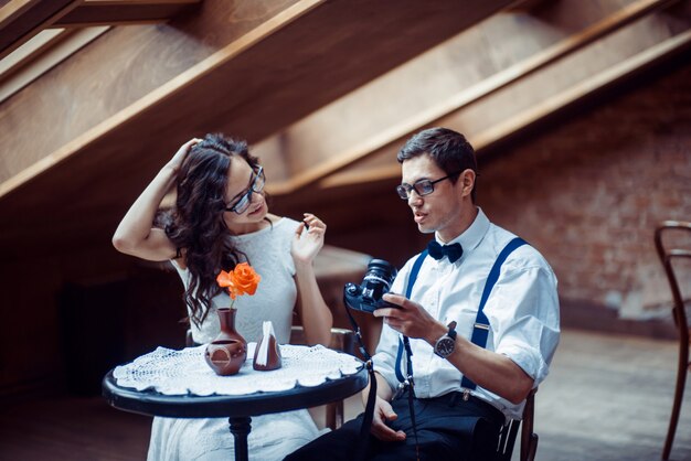 Romantic couple in love bonding in cafe