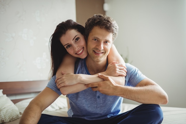 Romantic couple relaxing on bed