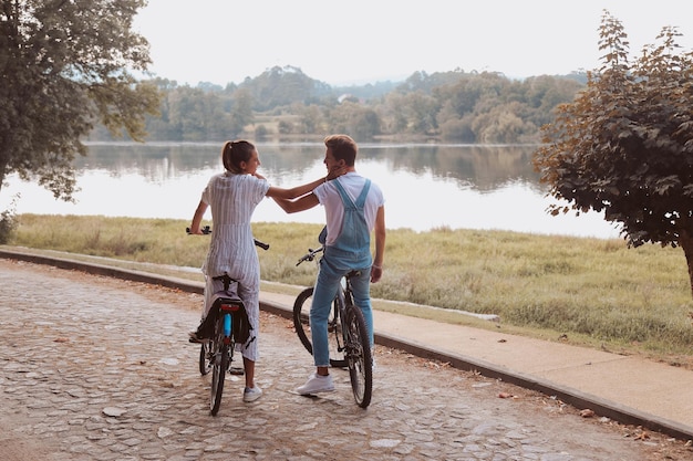 Romantic couple riding bicycles on a date