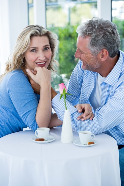 Romantic couple sitting in restaurant