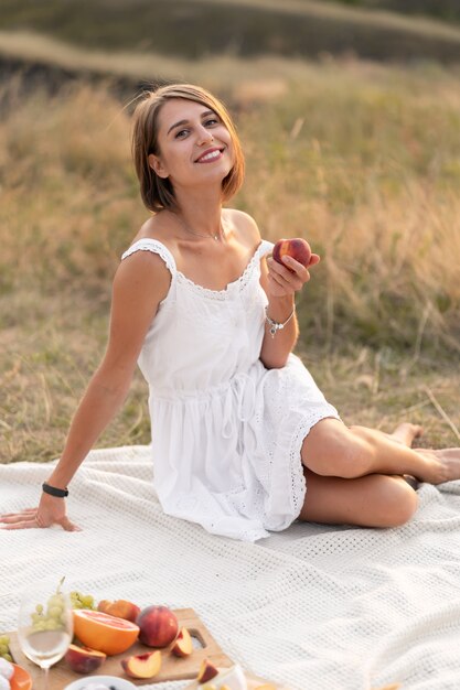 A romantic date with a beautiful girl. An evening picnic in a picturesque, uninhabited place.