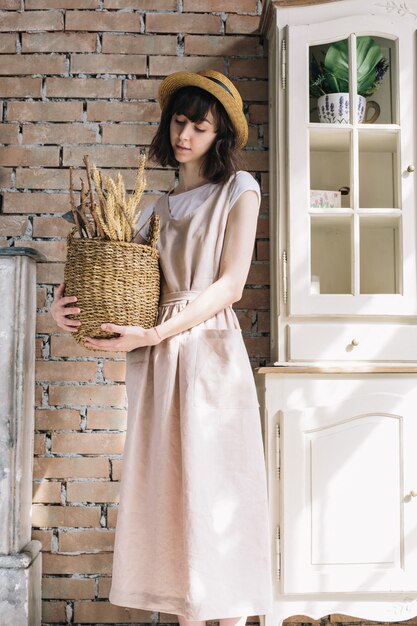 Romantic girl with basket in her hands