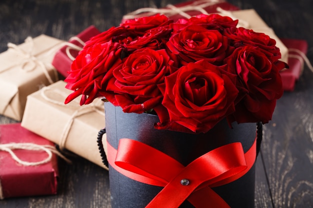 Romantic luxury red roses in a black gift box