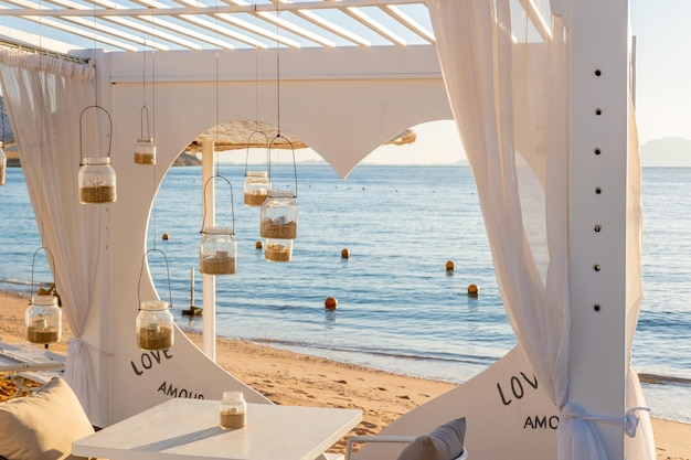 Romantic marquee for lunch on a sandy beach