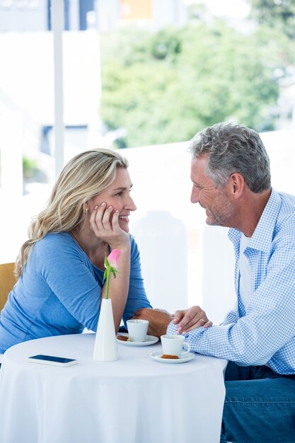 Romantic mature couple at restaurant