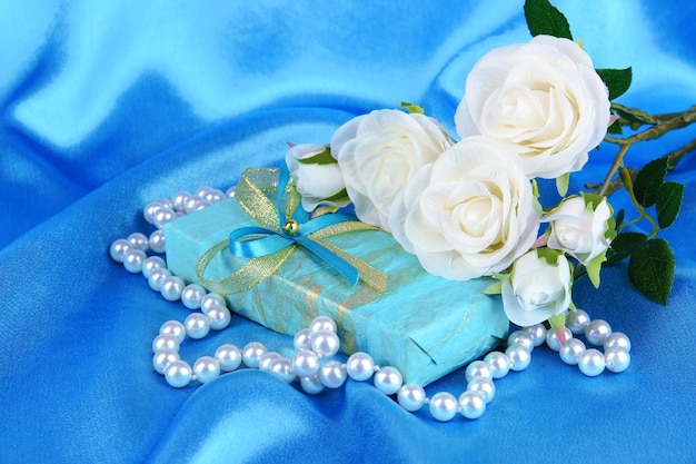 Romantic parcel on blue cloth background