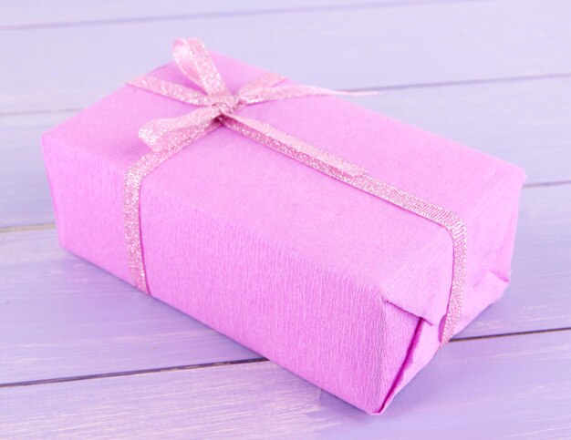 Romantic parcel on wooden background