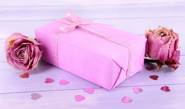 Romantic parcel on wooden background