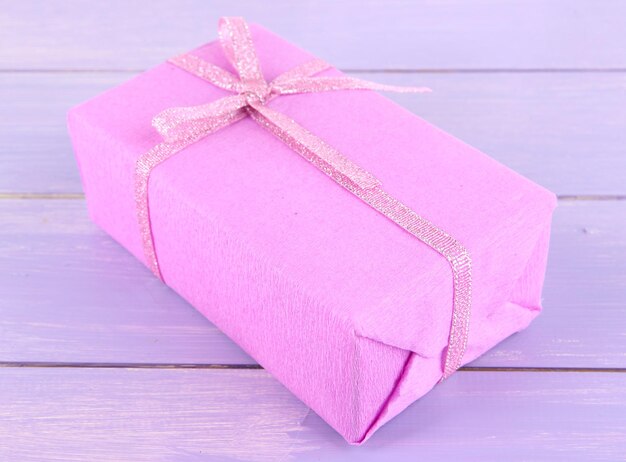 Romantic parcel on wooden background