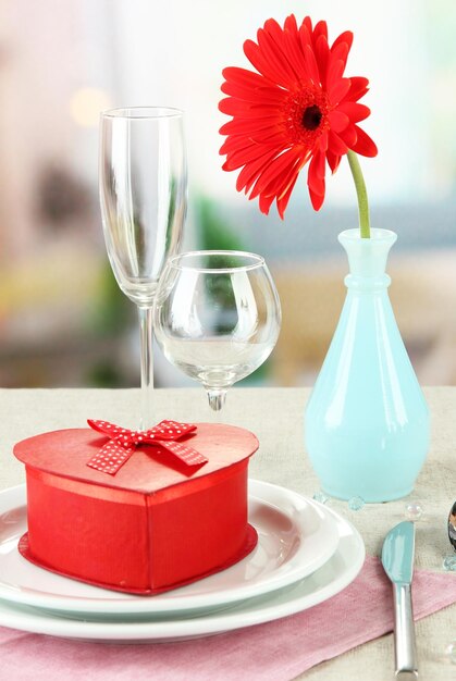 Romantic table serving on bright background