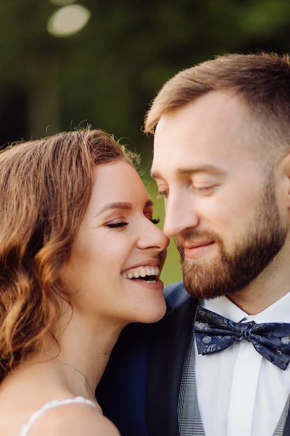 Romantic wedding couple in love walks in the mountains and forest