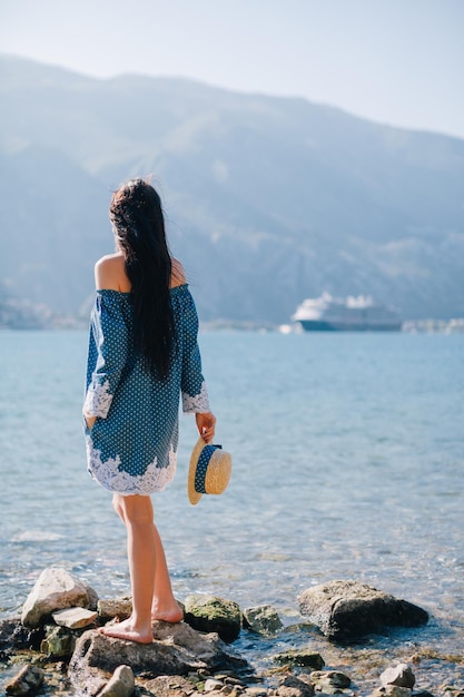 Romantic woman walk on beach. Asian beach and sea view.