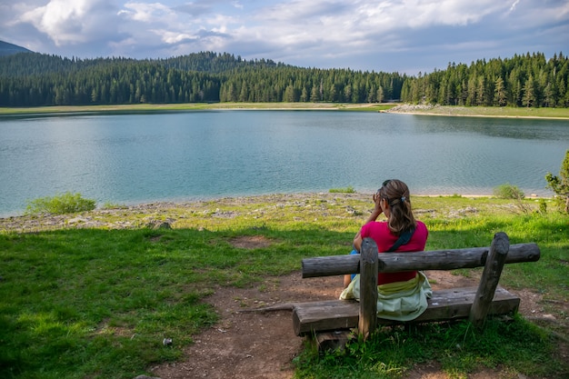 Romantic wooden benches near the Black Lake in Durmitor National Park Montenegro