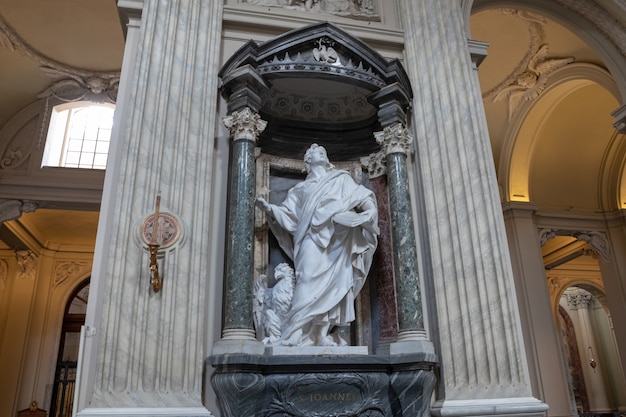 Rome, Italy - June 20, 2018: Panoramic view of interior of Lateran Basilica, also known as Papal Archbasilica of St. John. It is the cathedral church of Rome and serves as seat of the Roman Pontiff