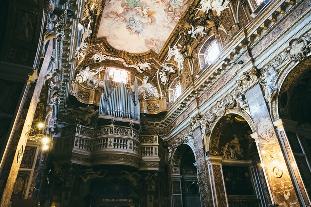 Rome, Italy - June 21, 2018: Panoramic view of interior of Santa Maria della Vittoria. It is a Catholic titular church dedicated to the Virgin Mary located in Rome