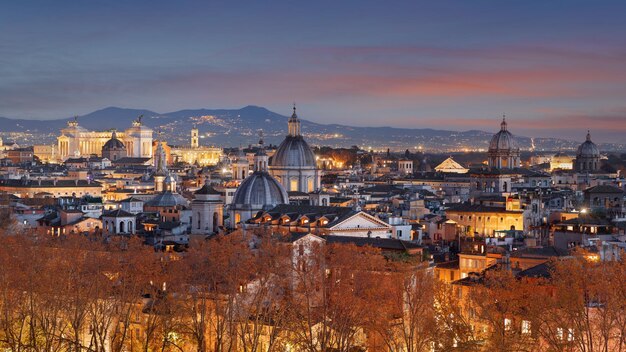 Photo rome italy skyline at dusk