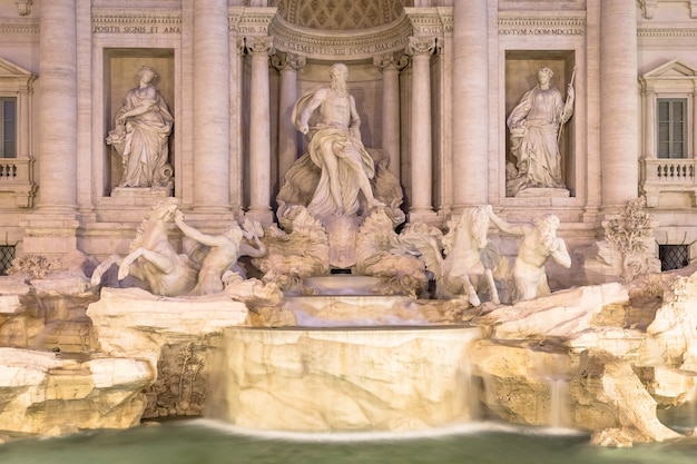 Rome, italy. trevi fountain at night, the masterpiece of
italian classical baroque architecture.