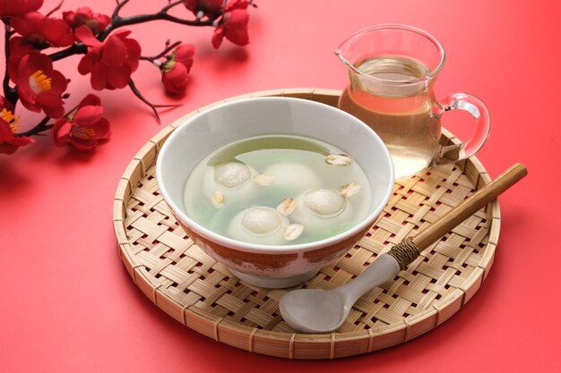 Ronde tang yuan glutinous rice dumpling balls is a traditional warm drink with ginger