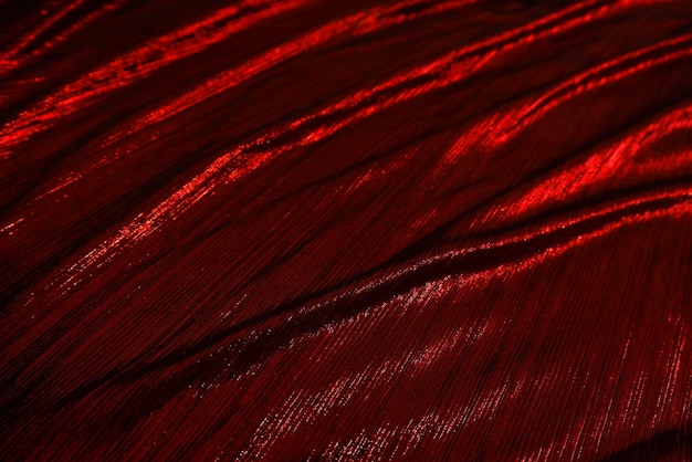 Rood reflecteren fluwelen stof textuur gebruikt als achtergrond Lege rode stof achtergrond van zacht en glad textiel materiaal Er is ruimte voor textx9