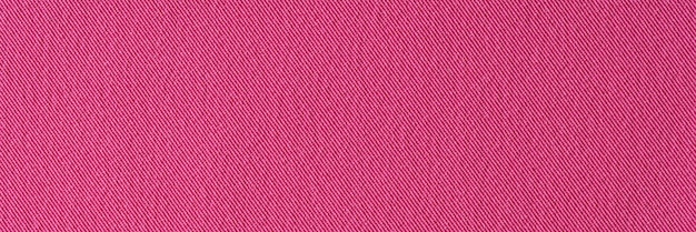 Rood roze denim textiel achtergrond stof achtergrond oppervlaktetextuur concept