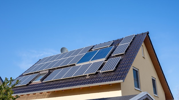 A roof of a family house with solar panels