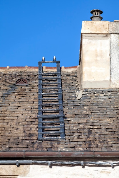 Roof ladder on an old slate roof