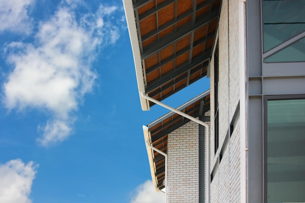 Roof steel structure roof design and modern building with blue sky white cloud