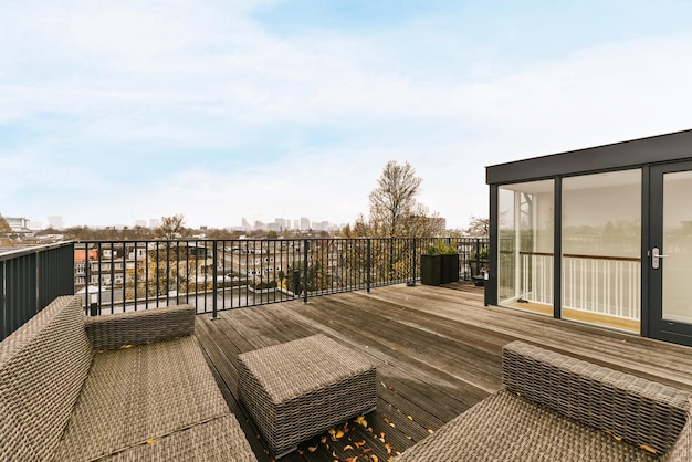 Roof with an amazing wooden floor and black railings