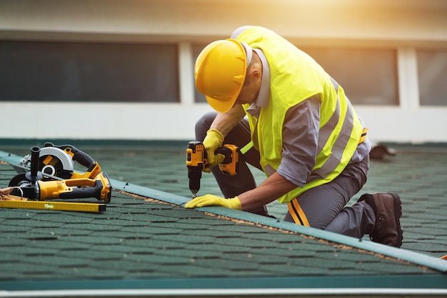 roofer working in protective work wear gloves