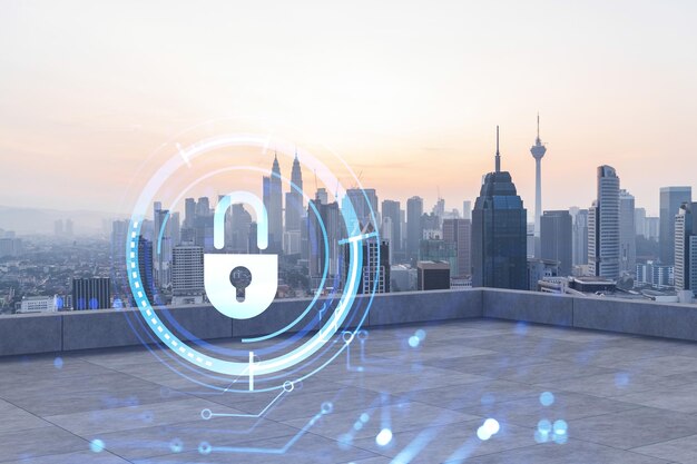 Rooftop with concrete terrace Kuala Lumpur sunset skyline Cyber security concept to protect clients confidential information IT hologram padlock icons City downtown Double exposure