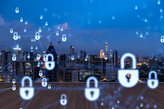 Rooftop with wooden terrace kuala lumpur night skyline cyber
security concept to protect clients confidential information it
hologram padlock icons city downtown double exposure