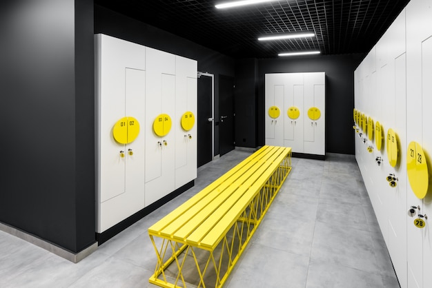 Room for changing clothes after workout and fitness. interior\
of modern locker room