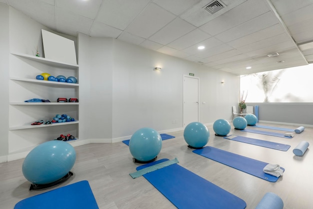 Photo room of a healing gym with objects and machines for this purpose in various shades of blue