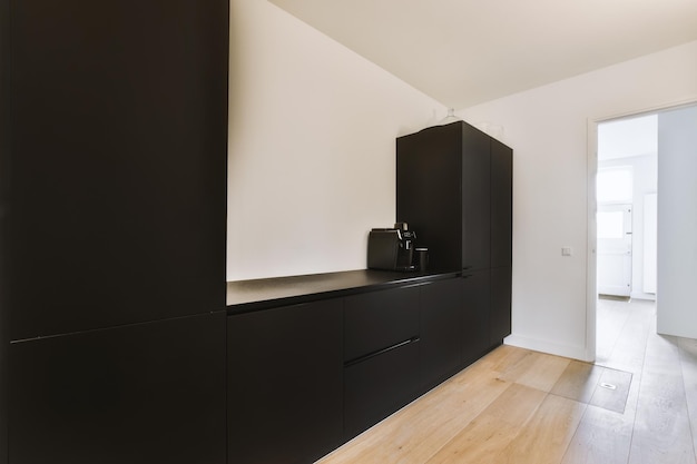 Room with black cabinets