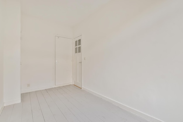 Room with door and parquet floor