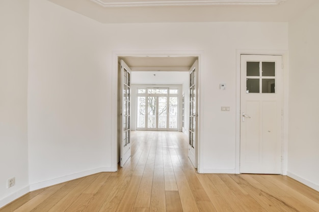 Room with door and parquet floor