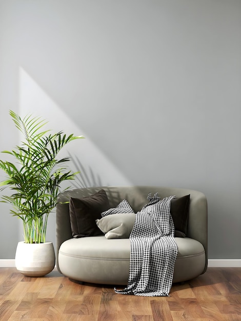 Room with an empty wall, orange chair, plants, wooden table, wooden floor, and hanging lamp.