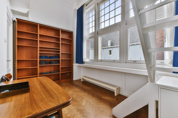 A room with a large bookcase