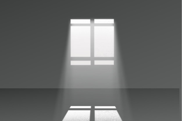 A room with a window and light shining through it